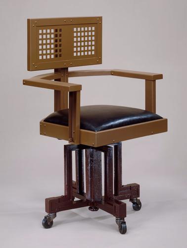 This Frank Lloyd Wright chair has no ornamentation and has a ...