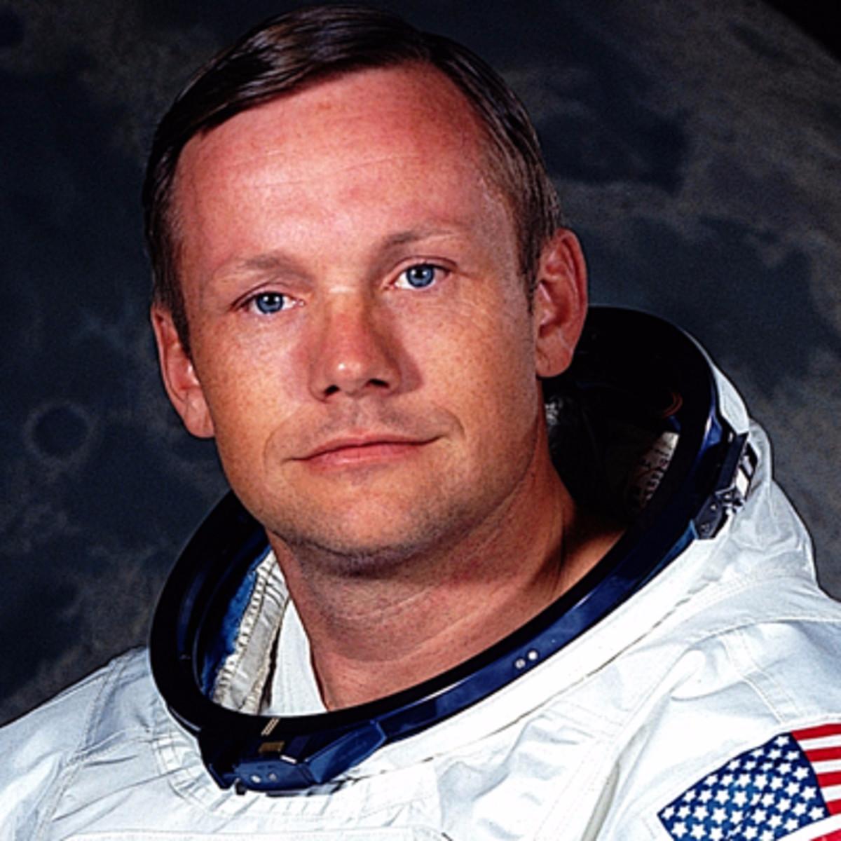 Neil Armstrong , was the very first man to walk on the moon in 1961.