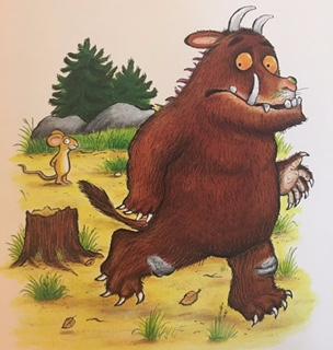 The Gruffalo runs away, outsmarted by Mouse.