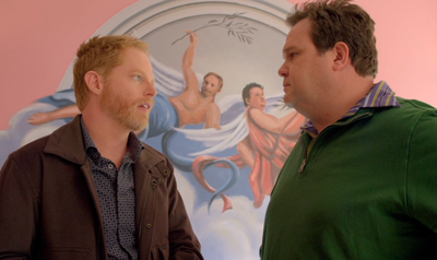 Mitchell and Cameron argue about the painting. Cameron tells Mitchel.