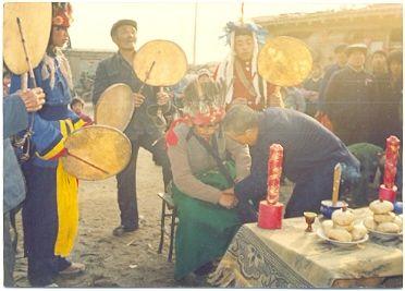 This is a Manchu Shaman ritual being performed.