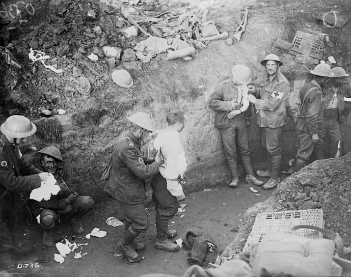 7. The wounded are dressed in a trench during the Courcelette operation ...