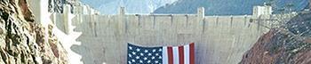 American flag hung from Hoover Dam, via the US Bureau of Reclamation