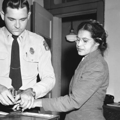 Parks was being fingerprinted by a policeman during her arrest. Image ...