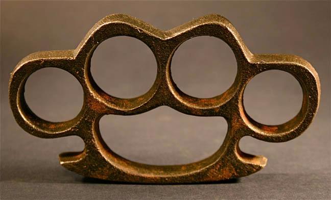 The Kite Runner Symbol: Brass Knuckles