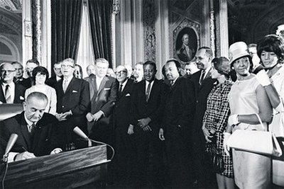 President Lyndon B. Johnson Signs The Voting Rights Act 1965.